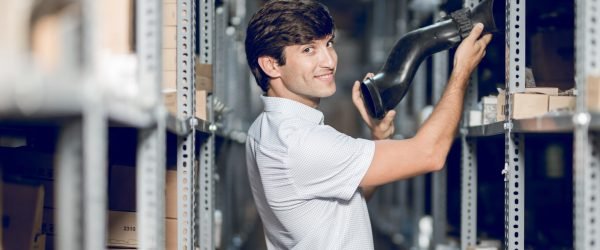 store-worker-taking-detail-from-warehouse